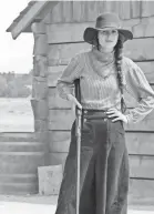  ??  ?? Alice (Michelle Dockery) is armed and dangerous in Godless. URSULA COYOTE/NETFLIX