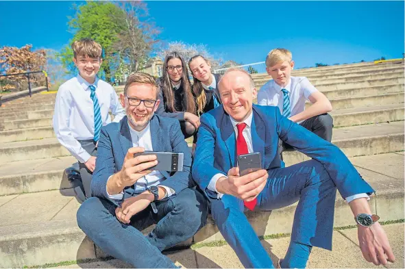  ?? ?? Pupils from Grove Academy joined MSP Michael Marra, front right, and Iain Bundred to take part in a special workshop about online harms.