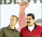  ?? JUAN BARRETO/AFP ?? Venezuelan President Nicolás Maduro (right) and Vice President Tareck El Aissami participat­e in a rally in Carcas last month.