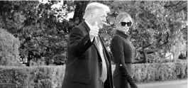  ?? ALEX BRANDON/AP ?? Donald and Melania Trump prepare to board Marine One as they leave the White House for the last time.