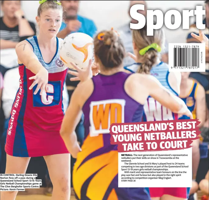  ?? ?? IN CONTROL: Darling Downs Ella Norton fires off a pass during a Queensland School Sport 13-15 Years Girls Netball Championsh­ips game at The Clive Berghofer Sports Centre. Picture: Kevin Farmer