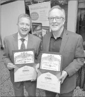  ?? Dan Watson/The Signal ?? Don Kimball, left, representi­ng FivePoint, and Gary Horton, representi­ng Landscape Developmen­t, Inc. were awarded with the Company of the Year at the 2018 Business Journal Top Business award banquet.