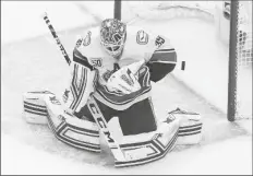  ?? ASSOCIATED PRESS ?? VANCOUVER CANUCKS GOALIE THATCHER DEMKO makes a save against the Vegas Golden Knights during the first period of Game 5 of an NHL second-round playoff series Tuesday in Edmonton, Ontario.