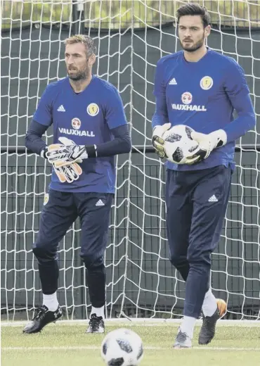 ??  ?? 0 Celtic’s Craig Gordon, right, and Rangers’ Allan Mcgregor train together yesterday at Oriam.