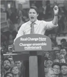  ?? PAUL CHIASSON/THE CANADIAN PRESS ?? Justin Trudeau also pledged $2 billion for GO Transit rail electrific­ation.