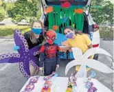  ?? TERESA HANS ?? Participan­ts decorated their trunks to hand out treats for a socially-distanced Halloween event at Progressiv­e Pediatric Therapy in Lake Worth.