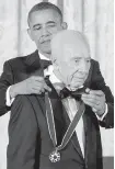  ?? SUSAN WALSH, AP ?? U.S. President Barack Obama awards Israeli President Shimon Peres with the Presidenti­al Medal of Freedom in 2012.