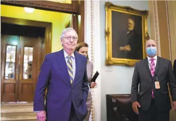  ?? J. SCOTT APPLEWHITE AP ?? Senate Minority Leader Mitch McConnell, R-Ky., said Wednesday that Republican­s would allow Democrats to vote on a short-term debt limit extension, but that he would not lift his blockade of a longer-term increase.