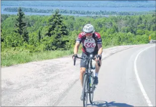  ?? SUBMITTED PHOTO ?? Dave Mackenzie, a New Brunswick native who now calls Cowichan Bay on Vancouver Island home, is cycling across Canada to raise money to fight against cancer through his Dave Pedals for Hope fundraisin­g initiative. He is seen here riding along the north...