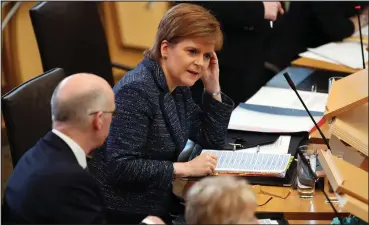  ??  ?? First Minister Nicola Sturgeon said there’s complexiti­es for the police prosecutin­g offences committed online