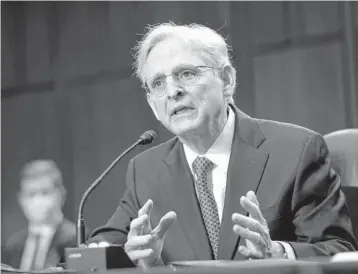  ?? DREW ANGERER/AP ?? Judge Merrick Garland testifies during his Senate confirmati­on hearing for attorney general Monday in which he pledged political independen­ce, saying, “I do not plan to be interfered with by anyone.”