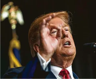  ?? Doug Mills / New York Times ?? President Donald Trump speaks at a joint fundraisin­g committee reception Friday in Sioux Falls, S.D. Trump has repeatedly turned official functions into opportunit­ies for campaignin­g.