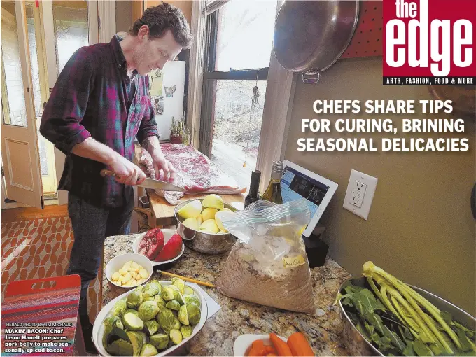  ?? HERALD PHOTO BY JIM MICHAUD ?? MAKIN' BACON: Chef Jason Hanelt prepares pork belly to make seasonally spiced bacon. CHEFS SHARE TIPS FOR CURING, BRINING SEASONAL DELICACIES