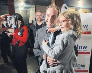  ?? JIM RANKIN TORONTO STAR ?? Josh Matlow and daughter Molly speak to reporters at his victory party at a midtown pub.