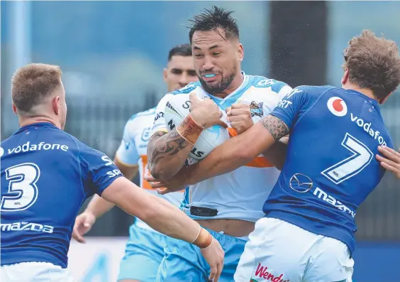  ??  ?? Patrick Herbert excelled on the wing for the Gold Coast Titans against Newcastle. Photo: Getty Images