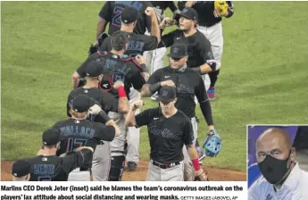  ?? GETTY IMAGES (ABOVE), AP ?? Marlins CEO Derek Jeter (inset) said he blames the team’s coronaviru­s outbreak on the players’ lax attitude about social distancing and wearing masks.