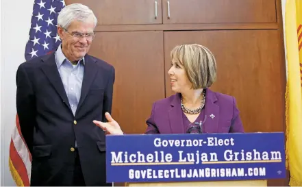  ??  ?? Gov.-elect Michelle Lujan Grisham announces Wednesday during a news conference in Albuquerqu­e that former U.S. Sen. Jeff Bingaman will lead her transition team.
