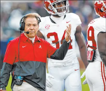  ?? Butch Dill The Associated Press ?? Alabama coach Nick Saban said “it would be a disrespect” if no SEC teams reach the College Football Playoff, but a win over Georgia on Saturday could do just that.
