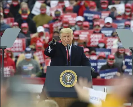  ?? BEN HASTY — MEDIANEWS GROUP ?? President Donald Trump at Reading Regional Airport in Bern Township on Saturday afternoon for a campaign rally in the closing days of his reelection campaign. Many of the thousands in the crowd chanted and cheered during the hourlong speech.