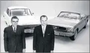  ?? AP ?? Ford executives Donald Frey, left, and Lee Iacocca stand in front of a 1960 Falcon and a 1965 Mustang in March 1965.