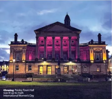  ??  ?? Glowing Paisley Town Hall was lit up to mark Internatio­nal Women’s Day