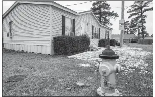  ?? Arkansas Democrat-Gazette/MITCHELL PE MASILUN ?? Snow melts Friday in the front of one of Bryant’s fire stations, at 200 S.W. Third St.