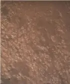  ?? AfP ?? La superficie de Marte captada por una de las cámaras del robot mientras descendía.