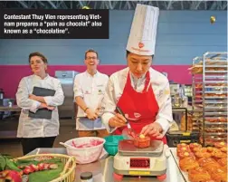  ?? ?? Contestant Thuy Vien representi­ng Vietnam prepares a “pain au chocolat” also known as a “chocolatin­e”.