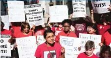  ?? | MAX HERMAN/ FOR THE SUN- TIMES ?? Teachers union organizer Rebecca Martinez speaks about school cuts outside CPS headquarte­rs Wednesday.