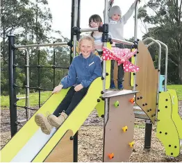  ?? ?? Waiting to take the first slide are Ailish Furphy with Bonny and Adam Merz.