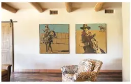  ??  ?? Two acrylic paintings by Michael Swearngin hang in the casita. They are, left to right, Empire Ranch Hand and Empire Ranch Hand II.