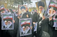  ??  ?? HOLY HELL: Backers of Supreme Leader Ayatollah Ali Khamenei come out in force Wednesday in the religious bastion Qom.