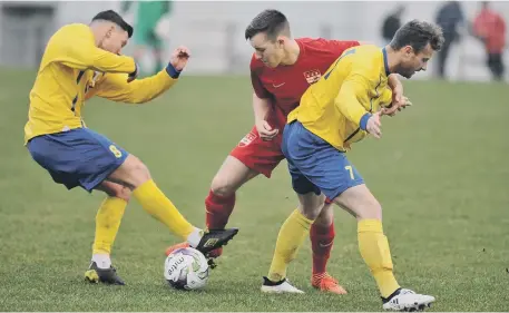  ??  ?? Sunderland RCA’s Reece Noble (left) and Clayton Davis battle against Washington (red) at Nissan on Saturday. Pictures by Tim Richardson.