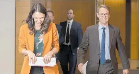  ?? Photo / Mark Mitchell ?? Jacinda Ardern and Ashley Bloomfield ready to go to level 1.