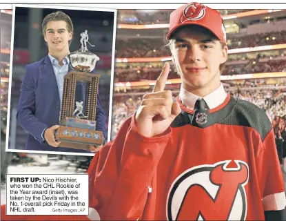  ?? Getty Images; AP ?? FIRST UP: Nico Hischier, who won the CHL Rookie of the Year award (inset), was taken by the Devils with the No. 1-overall pick Friday in the NHL draft.