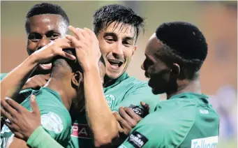  ??  ?? Amazulu players Emiliano Tade and Bonginkosi Ntuli celebrate their second goal against Cape Town City on Tuesday night in the Telkom Knockout. Usuthu won 2-0. They will next face Orlando Pirates in the quarter-finals. | Motshwari Mofokeng/African News Agency (ANA)