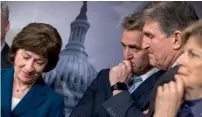  ?? AP ?? Senators Susan Collins, Jeff Flake, Joe Manchin and Jeanne Shaheen after a news conference at the Capitol in Washington. —