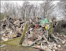  ??  ?? Waste dumped earlier this year on Barwell Lane