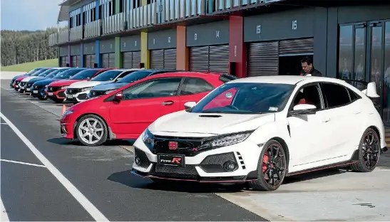  ??  ?? Honda’s new Civic Type R parked alongside an older Type R generation Civic at Hampton Downs.