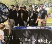  ??  ?? A group from Martha Turner Sotheby’s Internatio­nal Realty recently celebrated the opening of River Oaks Park.