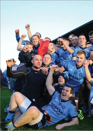  ??  ?? St Colmcille’s players and supporters celebrate their victory over Dunderry in the Intermedia­te Championsh­ip