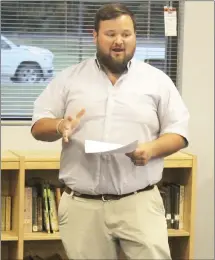  ?? Brodie Johnson • Times-Herald ?? Ryan Halbert, assistant high school principal in the PalestineW­heatley School District, discusses a new student drug-testing policy with board members Thursday night. The board voted to approve the policy during the special meeting.