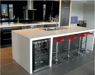  ??  ?? Kymira benchtops can be made in any shape or colour, with a deep lustre that runs to the core of the product.