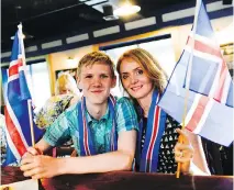  ?? JAMES PARK ?? Ólöf Sigvaldadó­ttir, a deputy head of mission at Embassy of Iceland, and her nephew Sigvaldi örn Óskarsson, visiting from Iceland, watch the match between Iceland and France at Georgetown Sports Pub.