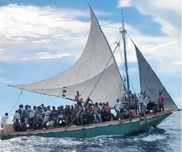  ?? UNITED STATES COAST GUARD ?? More than 100 Haitian migrants were intercepte­d about 18 miles east of Biscayne Bay on Sunday.