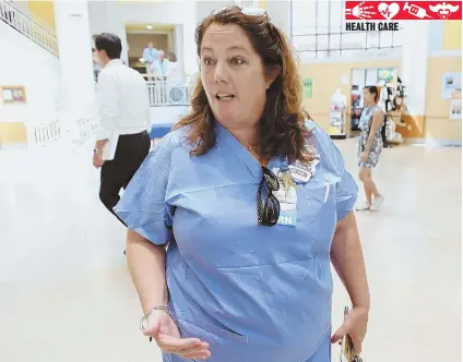  ?? StAffpHoto­byANGELARo­WLINGS ?? COMING TO A HEAD: Barbara Tiller, above, a registered nurse at Tufts Medical Center, said nurses ‘come here, get trained and leave to make $3 to $10 an hour more at other hospitals.’ Below, CEO Dr. Michael Wagner said nurses are asking for money the...