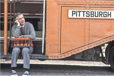  ?? LYNN JOHNSON ?? Fred Rogers poses in an undated publicity photo. A Rogers quote about looking for helpers is often cited about acts of violence.