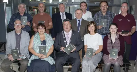  ??  ?? At the launch of ‘Stories from the Shed’ in Wexford Library, from left (back): Harry Lambert , Cllr Mick Roche, Tony Myers, Brendan Howlin TD, Donnacha Murphy, Tony Kerrigan and Seamus Corrigan; (seated): Tom Lohan, Cathy Fowley, Cllr George Lawlor (who launched the book), Carmel Conroy and Mary Savage (Wexford Library).