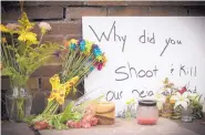  ?? ELIZABETH FLORES/STAR TRIBUNE ?? A makeshift memorial is left on Monday at the location where a Minneapoli­s police officer fatally shot Justine Damond late Saturday.