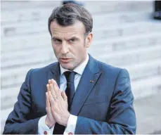  ?? FOTO: LUDOVIC MARIN/DPA ?? Der französisc­he Präsident Emmanuel Macron sieht keine Fehler in seiner lockeren Corona-Politik.
